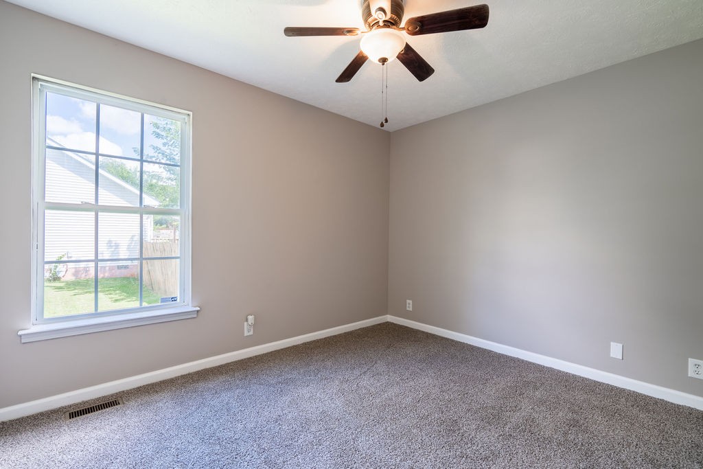 122 Cora Street Portland, TN 37148 - Photo 12 of 28 an empty room with a window