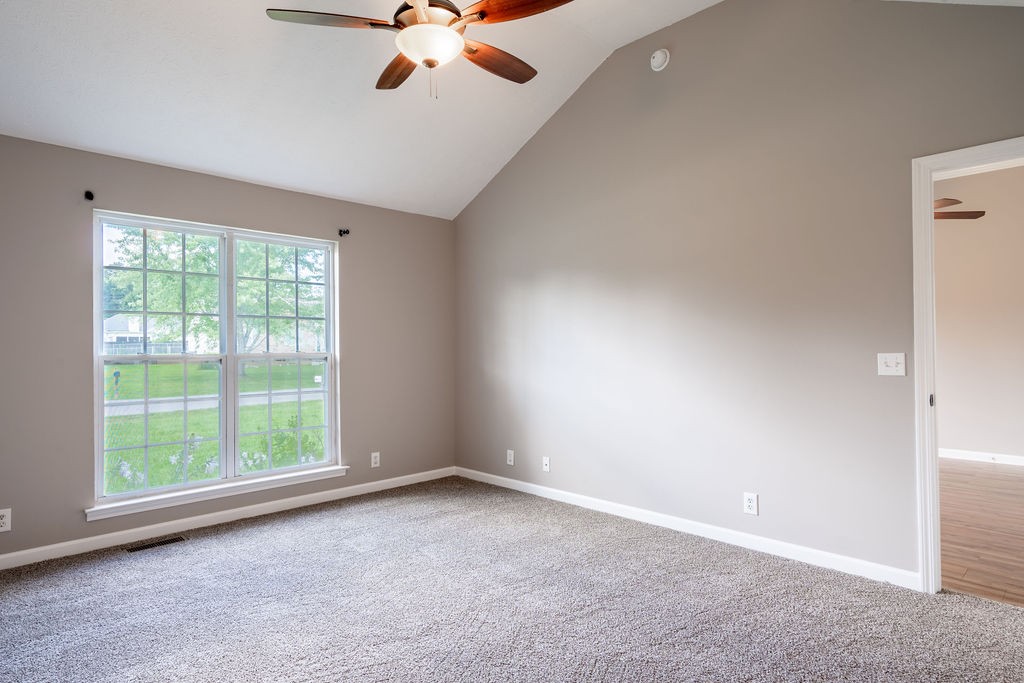 122 Cora Street Portland, TN 37148 - Photo 13 of 28 an empty room with windows and fan