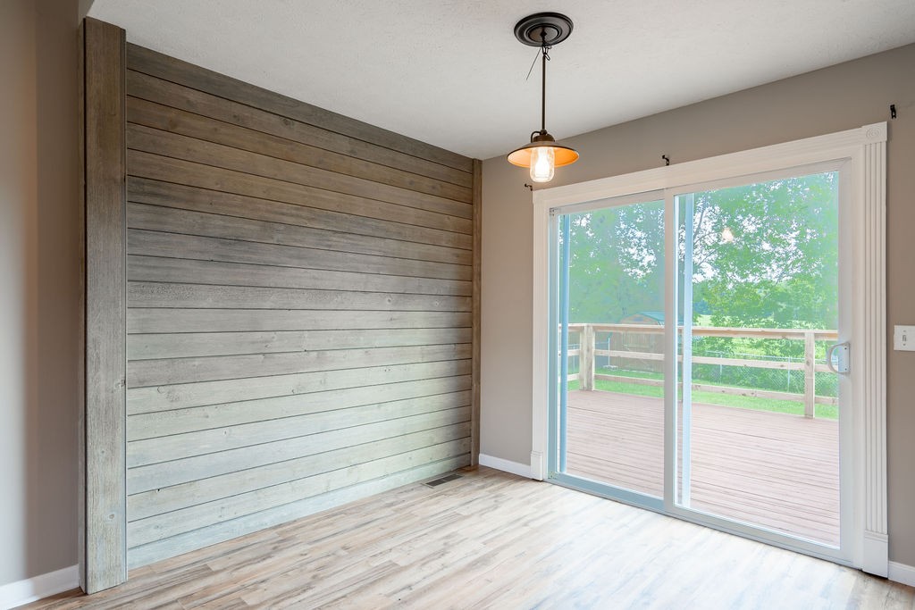 122 Cora Street Portland, TN 37148 - Photo 28 of 28 a view of empty room with wooden floor and fan