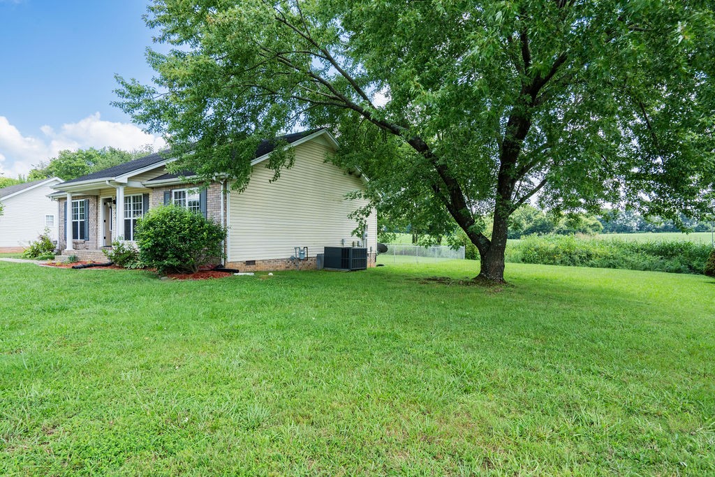 122 Cora Street Portland, TN 37148 - Photo 3 of 28 a view of a house with a yard