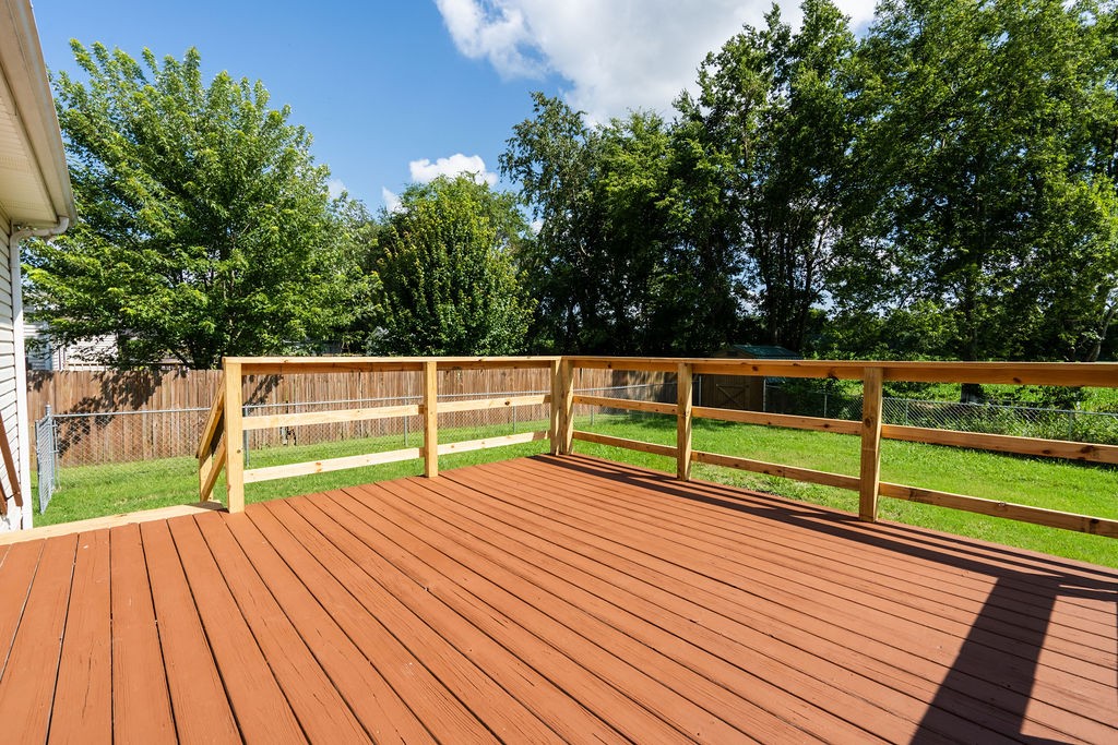 122 Cora Street Portland, TN 37148 - Photo 4 of 28 a view of park with wooden floor and fence