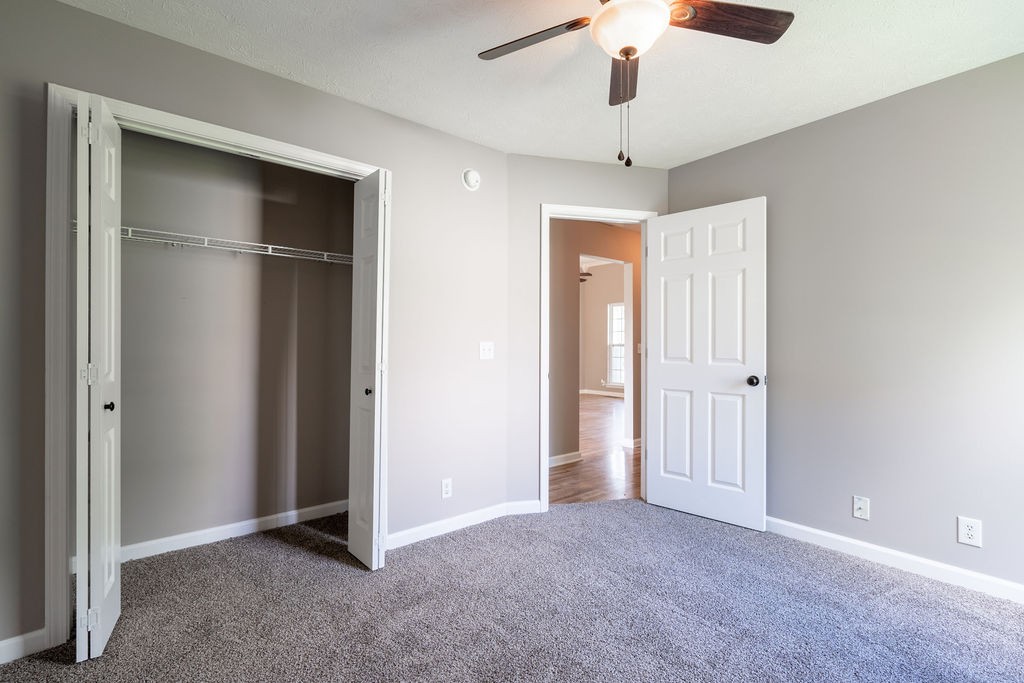 122 Cora Street Portland, TN 37148 - Photo 9 of 28 a view of an empty room with a ceiling fan