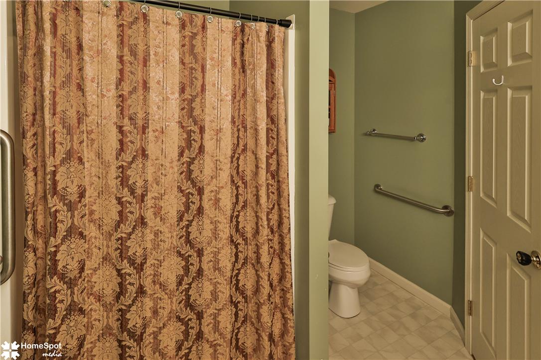 507 Howertown Road Northampton, PA 18067 - Photo 33 of 46 Functional bathroom featuring a toilet with grab bars, promoting accessibility and safety.
