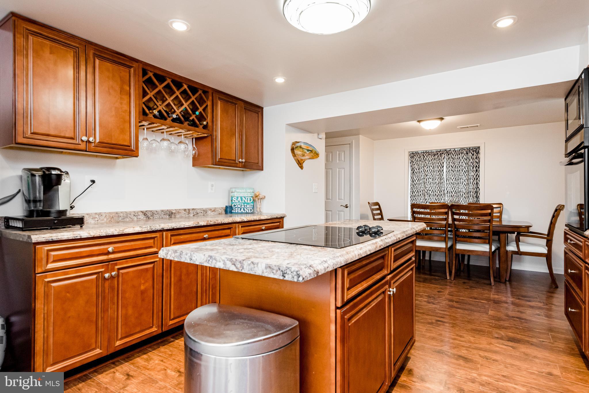1275 Delmont Road Severn, MD 21144 - Photo 40 of 40 KITCHEN OPEN FLOOR PLAN TO DINING AREA