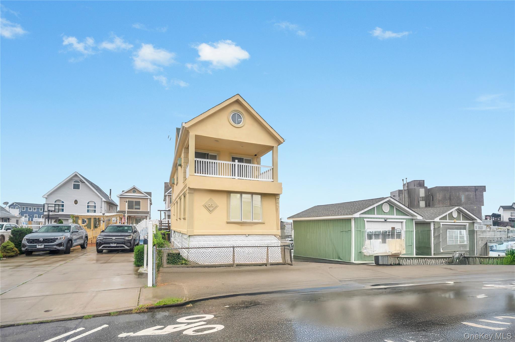 View of front of house featuring a residential view and stucco siding