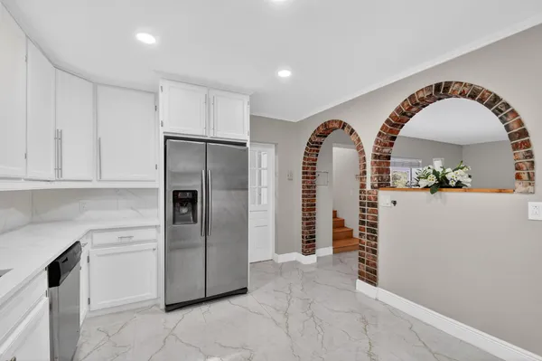 a view of a dining room with furniture