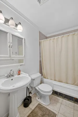 a bathroom with a shower and a bathtub