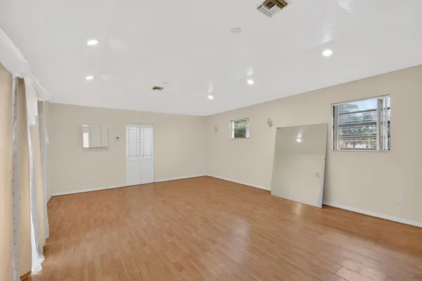 a view of a room with racks on the wall