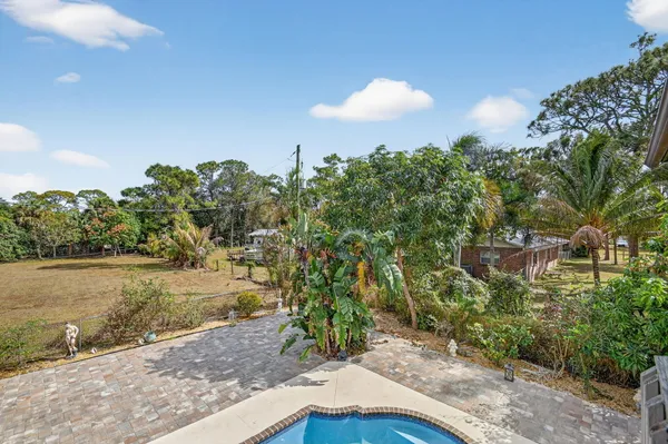 a view of a swimming pool with an outdoor space