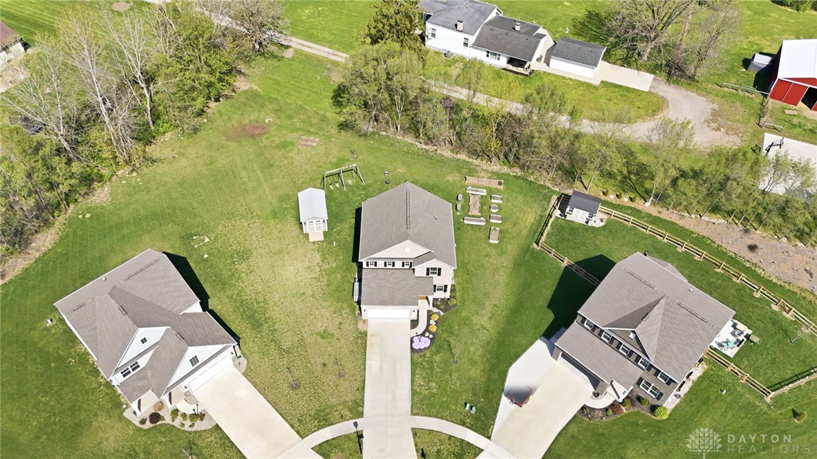 7900 Timberview Court Franklin, OH 45005 - Photo 58 of 60 This aerial view showcases a residential property with ample green space and nearby natural surroundings.
