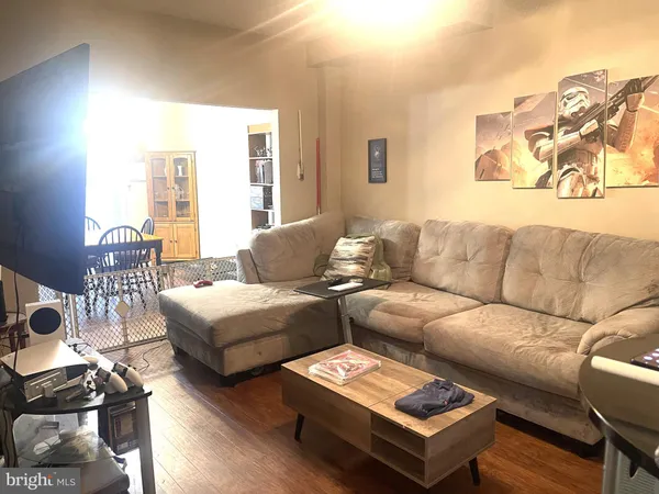 a living room with furniture and a couch