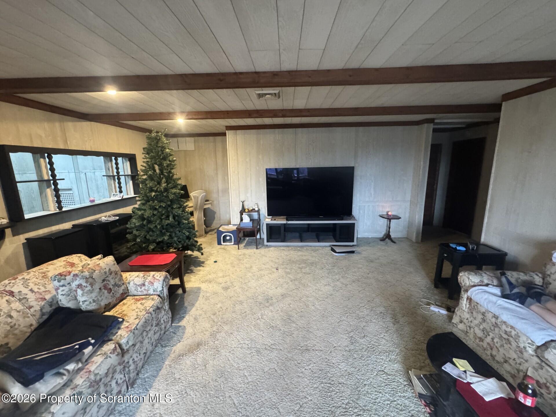 16 Maffett Street Plains, PA 18705 - Photo 12 of 19 a living room with furniture and a flat screen tv