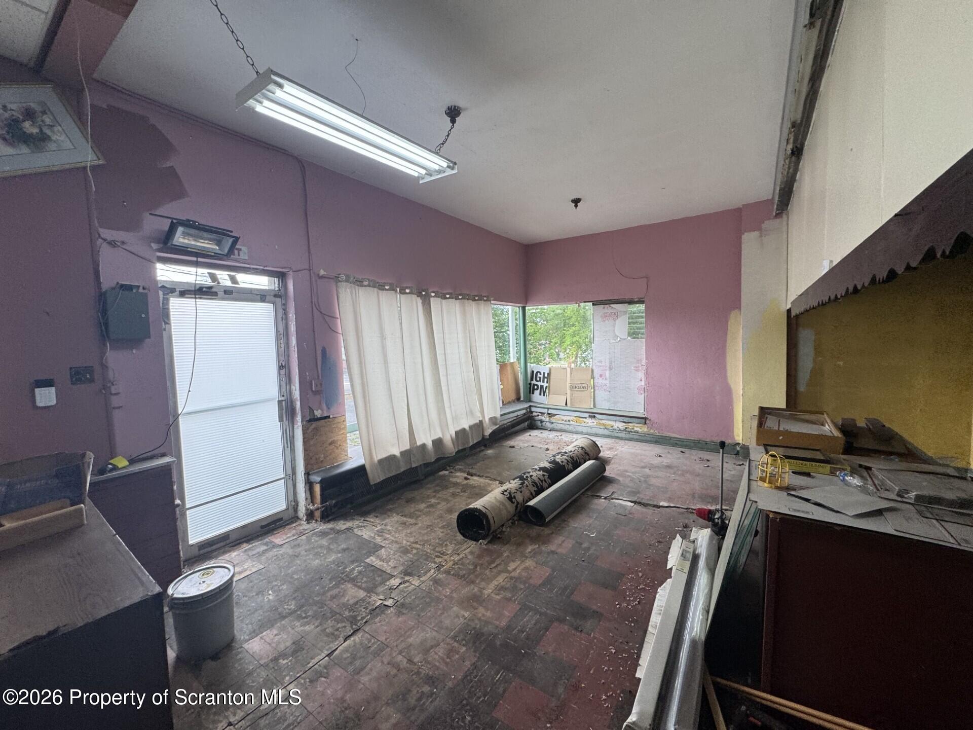 16 Maffett Street Plains, PA 18705 - Photo 15 of 19 a room with furniture and a window