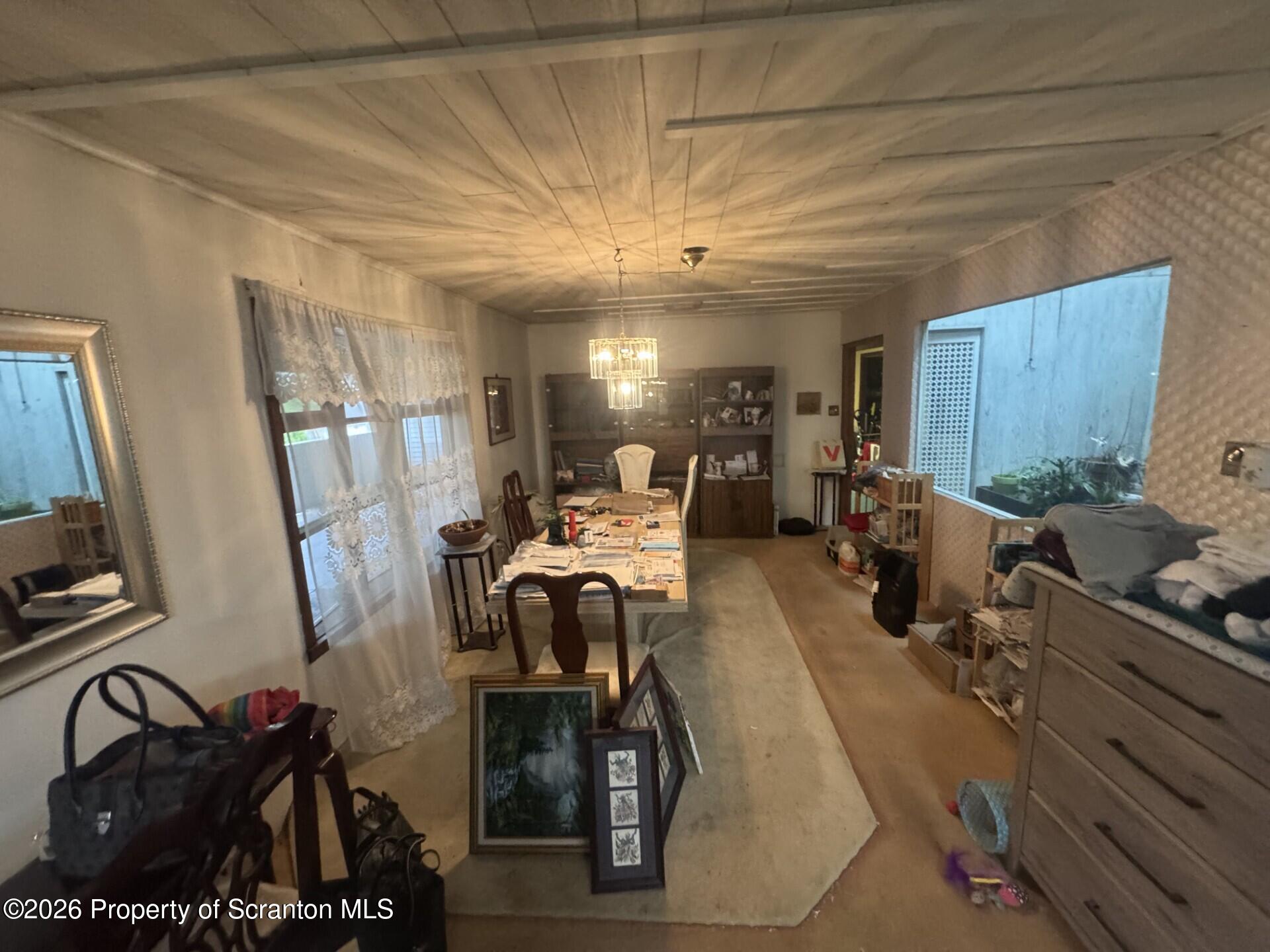 16 Maffett Street Plains, PA 18705 - Photo 6 of 19 a room with gym equipment and a mirror