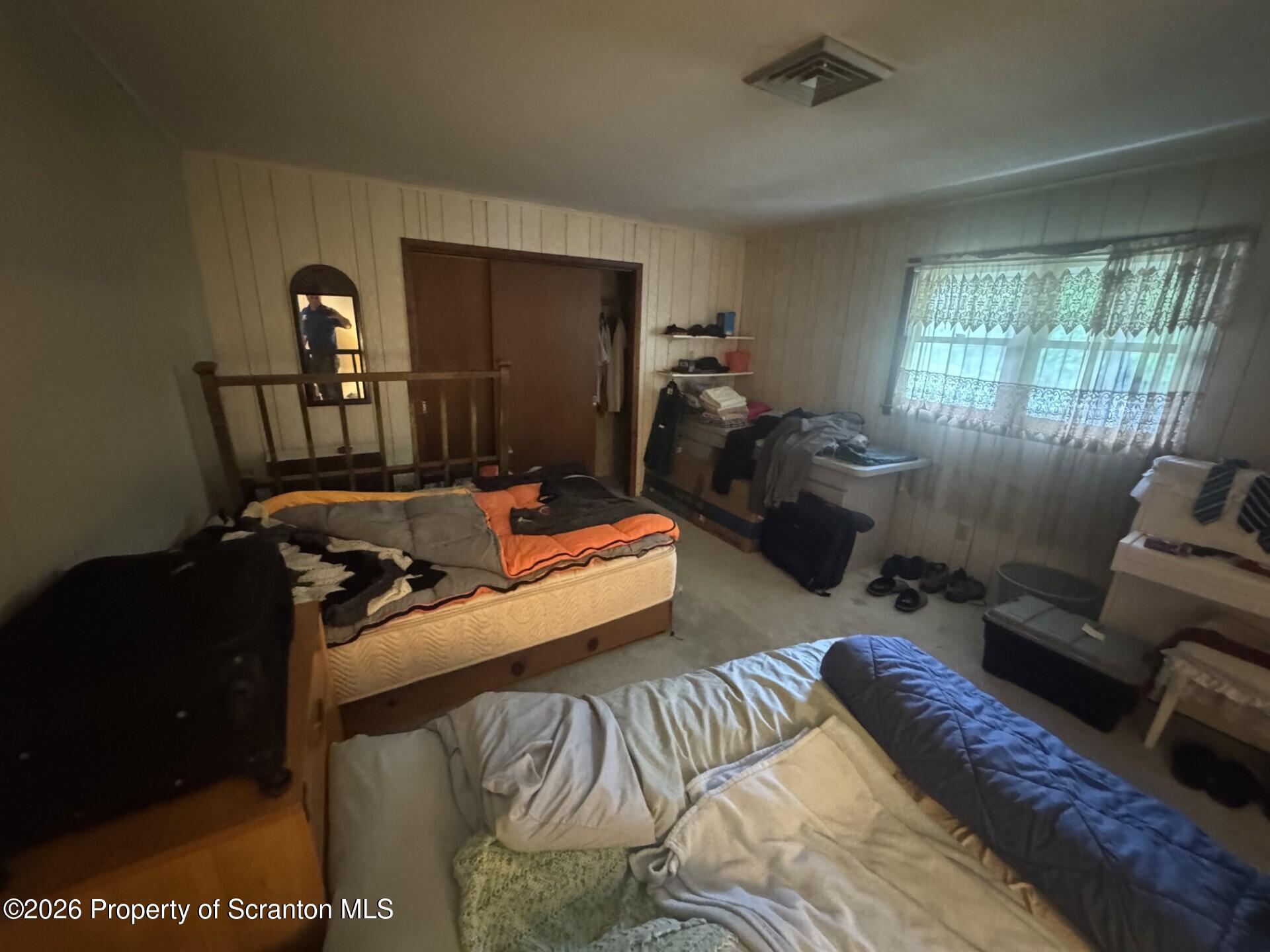 16 Maffett Street Plains, PA 18705 - Photo 9 of 19 a bed room with furniture and a window