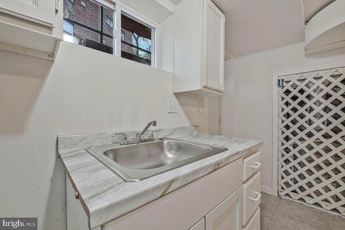 107 Joliet Street Washington, DC 20032 - Photo 44 of 52 a close view of sink and tap