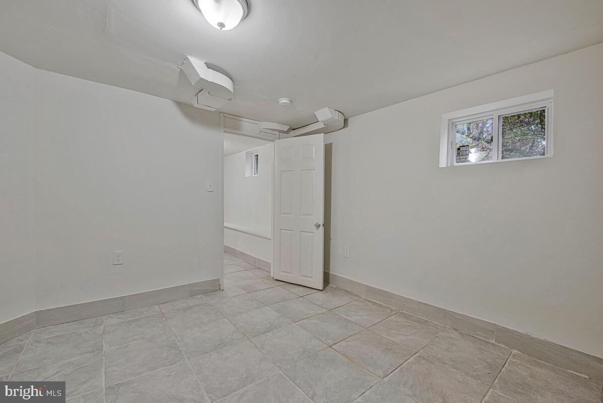 107 Joliet Street Washington, DC 20032 - Photo 48 of 52 a view of a room with an empty space