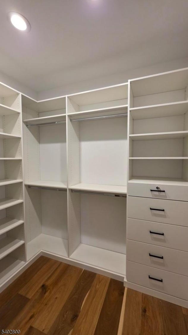 27 Sanders Road Rockaway, NJ 07866 - Photo 12 of 16 a view of walk in closet with empty racks