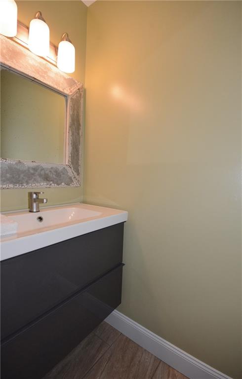 1222 Driftwood Drive Mt. Lebanon, PA 15243 - Photo 16 of 25 a bathroom with a sink and a mirror