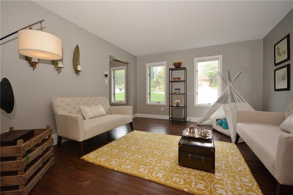 1222 Driftwood Drive Mt. Lebanon, PA 15243 - Photo 5 of 25 a living room with furniture and a rug