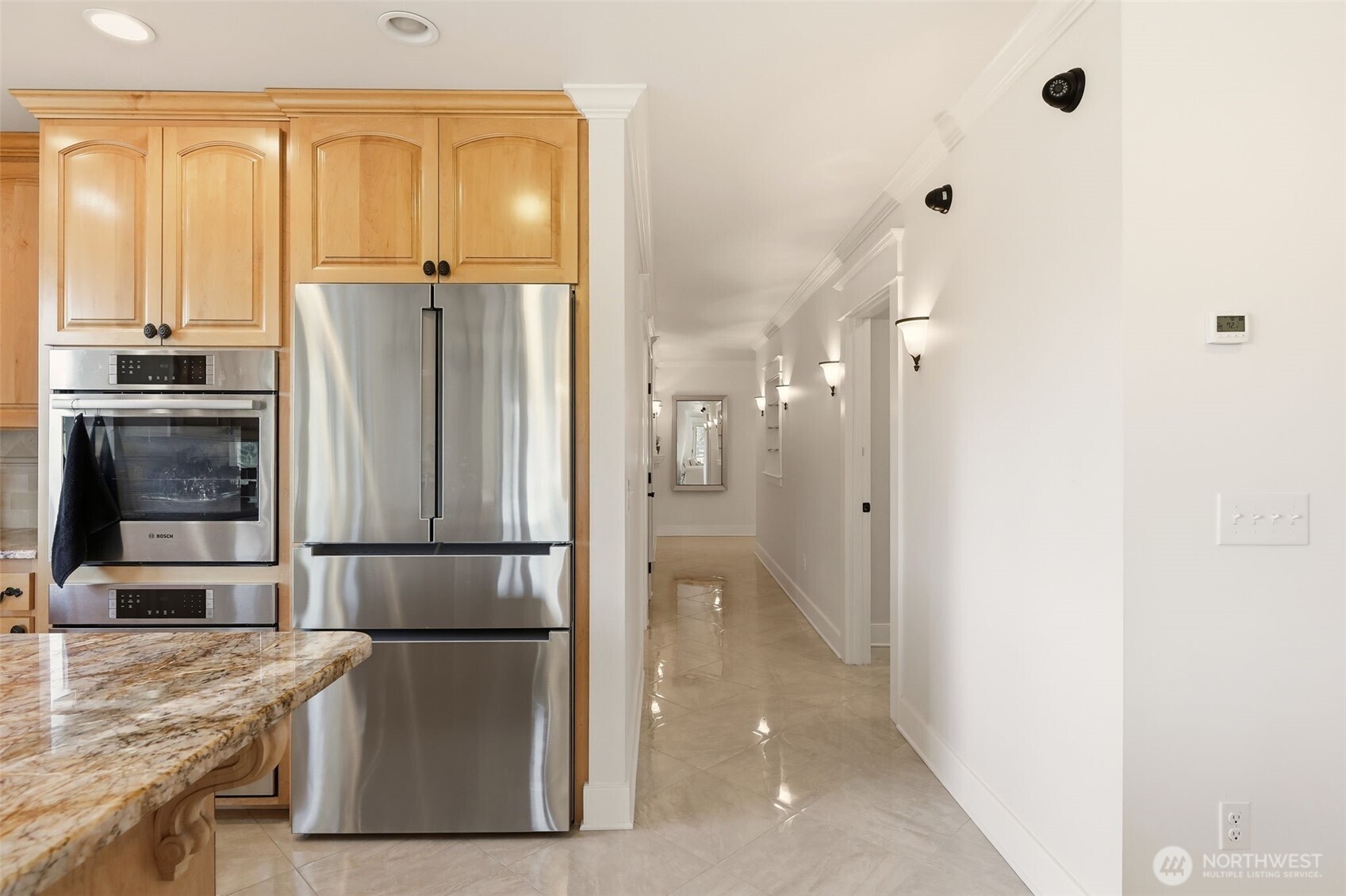 3821 Shelby Road Lynnwood, WA 98087 - Photo 12 of 40 a kitchen with stainless steel appliances granite countertop a refrigerator and a stove