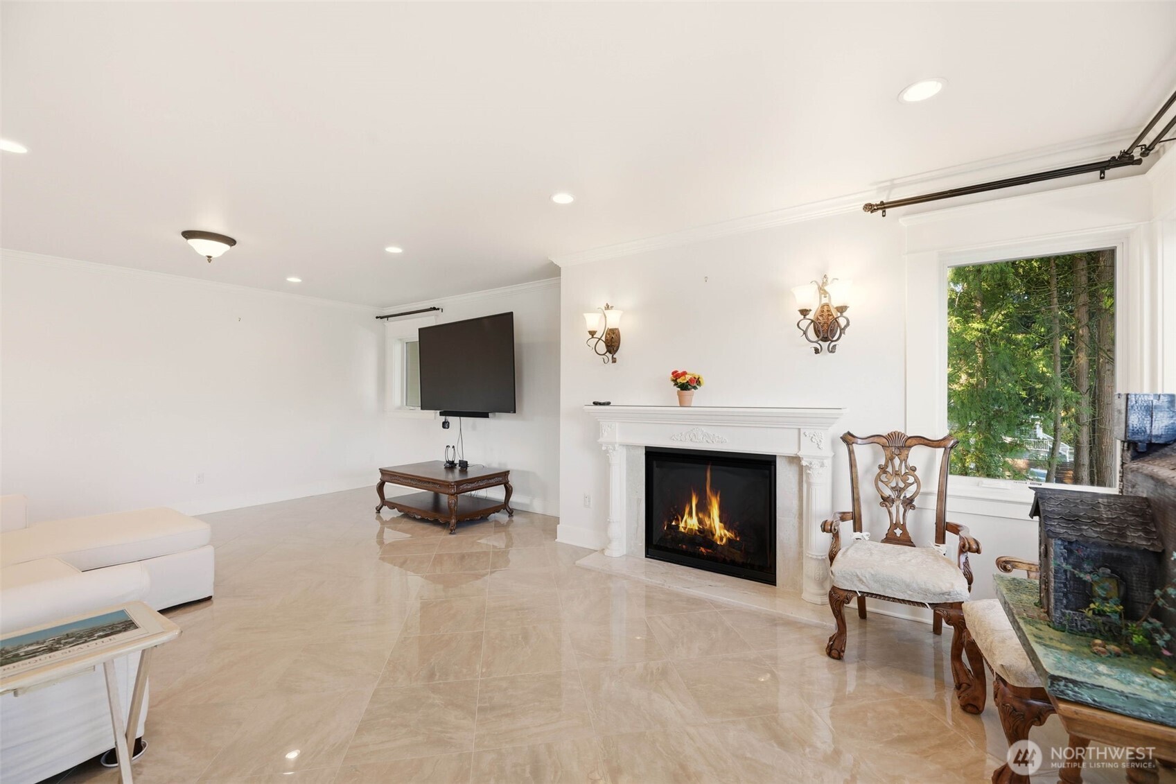 3821 Shelby Road Lynnwood, WA 98087 - Photo 15 of 40 a living room with furniture and a fireplace