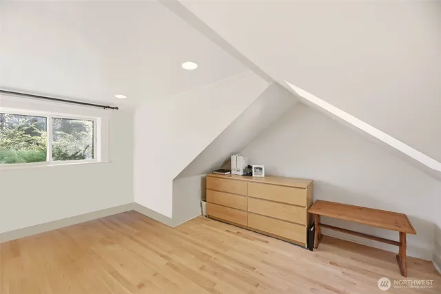 a view of bedroom with furniture and window