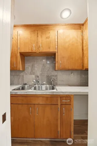 a sink with a mirror