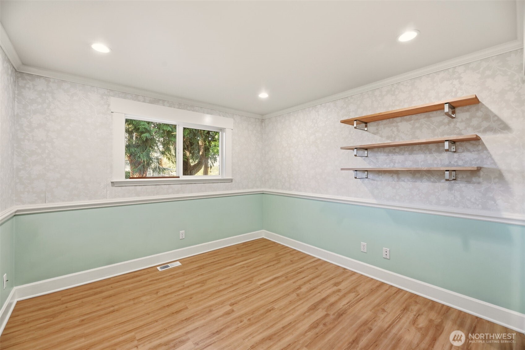 3821 Shelby Road Lynnwood, WA 98087 - Photo 29 of 40 a room with a wooden floor and a window