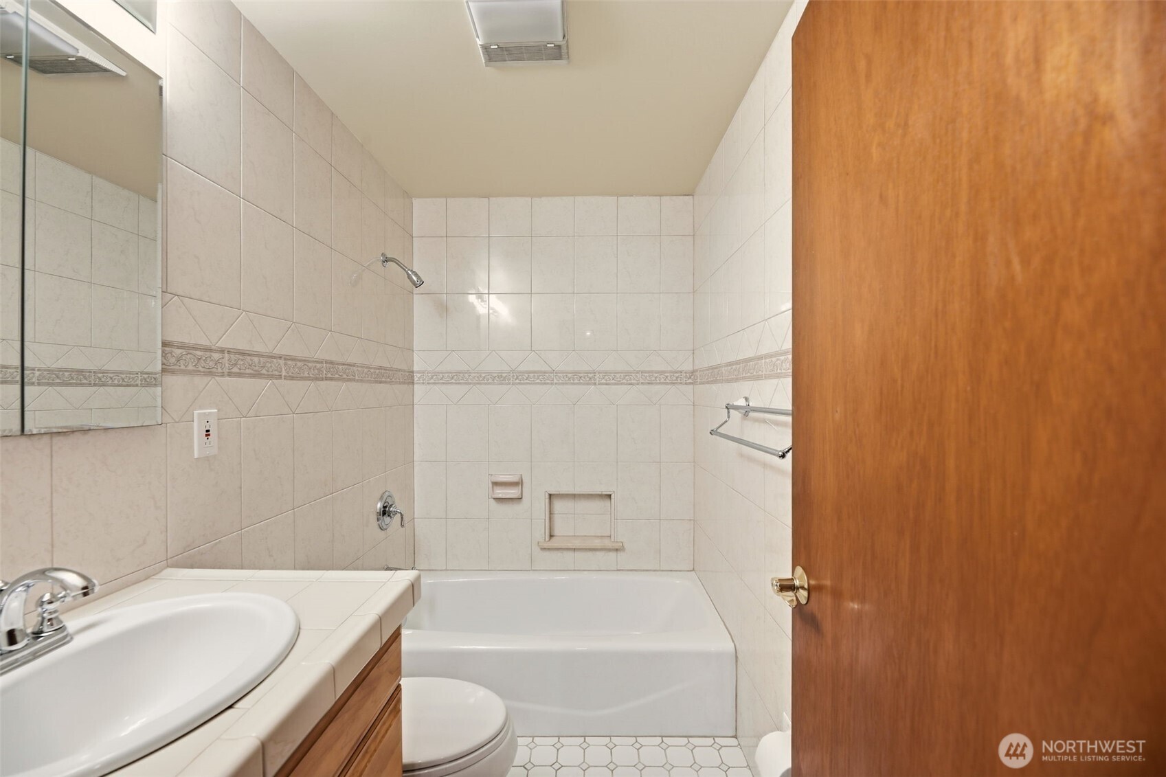 3821 Shelby Road Lynnwood, WA 98087 - Photo 32 of 40 a bathroom with a sink toilet and shower