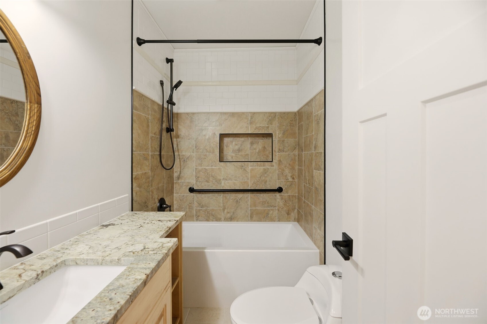 3821 Shelby Road Lynnwood, WA 98087 - Photo 34 of 40 a bathroom with a granite countertop sink toilet and shower