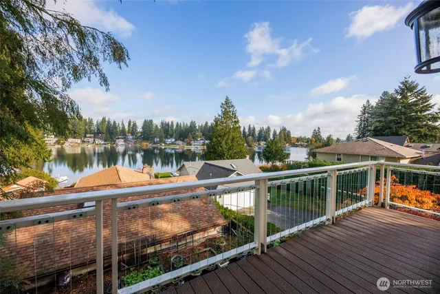 a view of a balcony with lake view