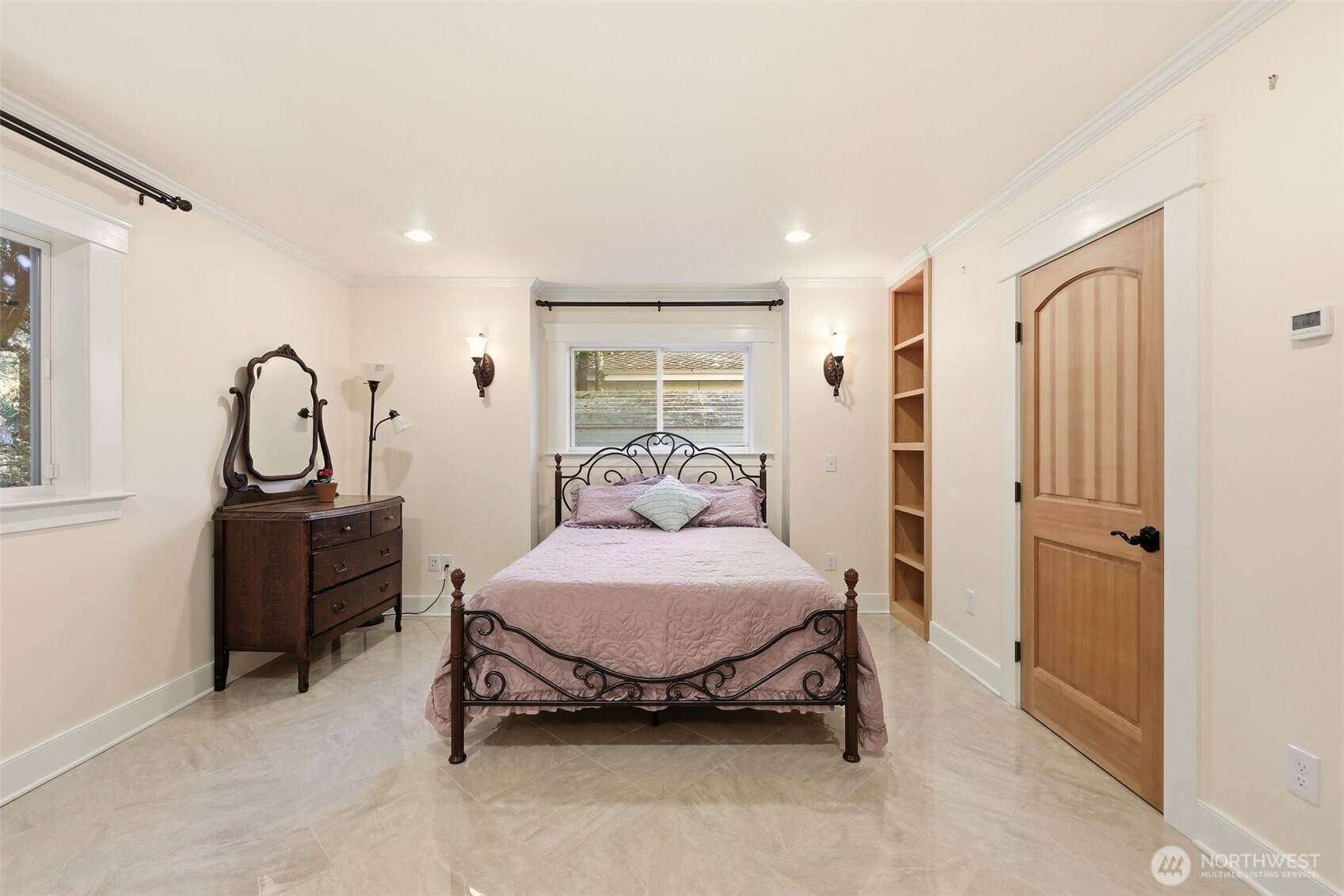 3821 Shelby Road Lynnwood, WA 98087 - Photo 4 of 40 a spacious bedroom with a bed and a dresser