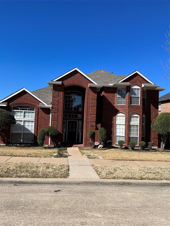 5013 Ridgecrest Drive The Colony, TX 75056 - Photo 1 of 1 a view of a house with a yard