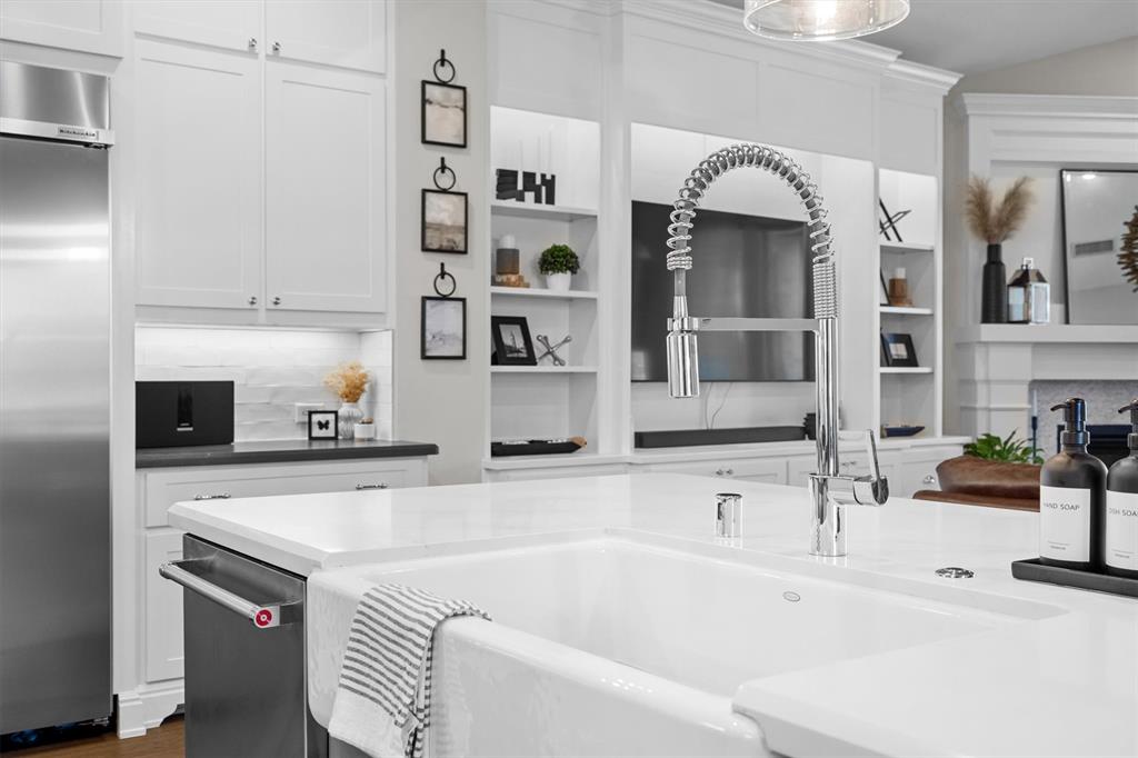 11459 Misty Ridge Drive Flower Mound, TX 76262 - Photo 17 of 38 a bathroom with a sink and a mirror