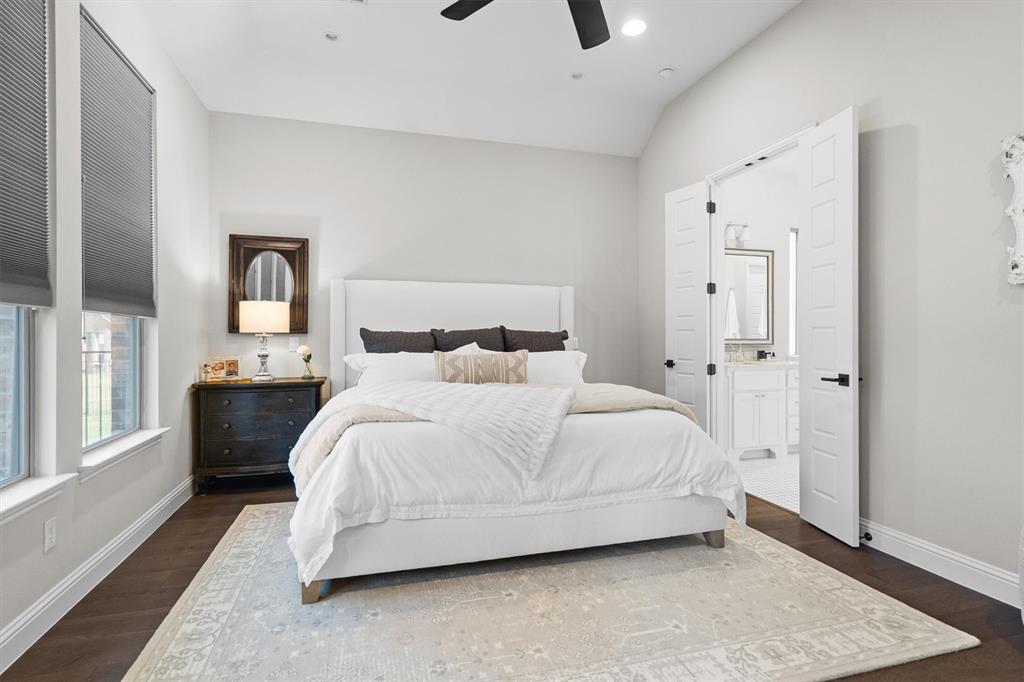 11459 Misty Ridge Drive Flower Mound, TX 76262 - Photo 21 of 38 a bedroom with a bed and a window