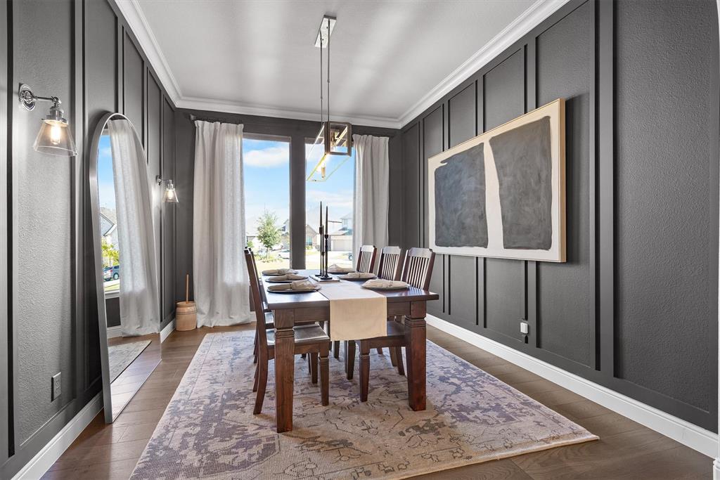 11459 Misty Ridge Drive Flower Mound, TX 76262 - Photo 6 of 38 a view of a dining room with furniture window and wooden floor