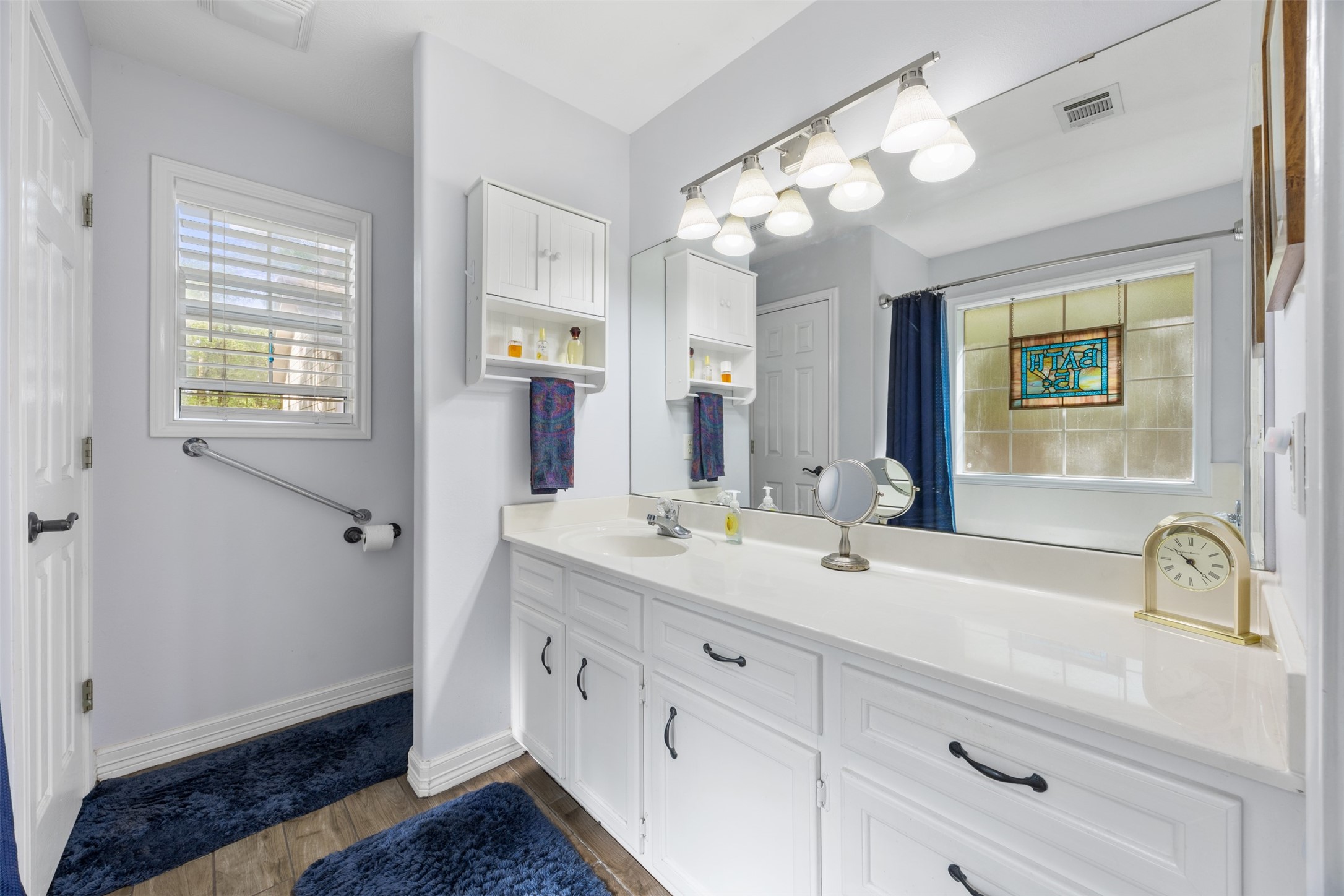 80 Indian Harbor Trinity, TX 75862 - Photo 15 of 47 a bathroom with a double vanity sink and a mirror