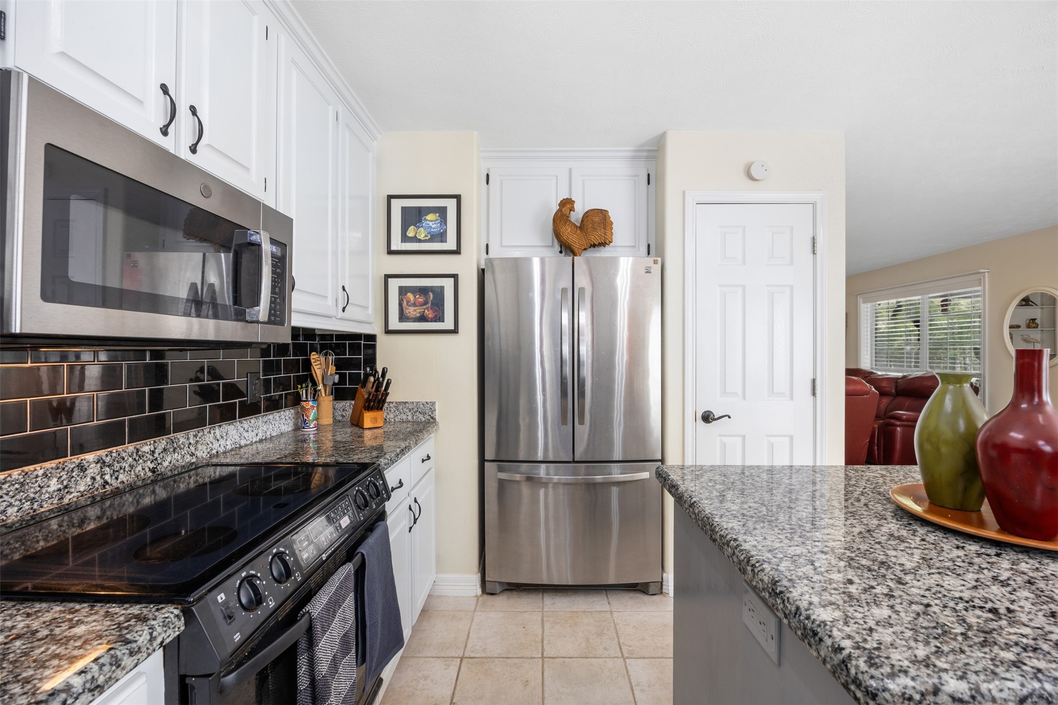 80 Indian Harbor Trinity, TX 75862 - Photo 22 of 47 a kitchen with stainless steel appliances granite countertop a refrigerator and a stove