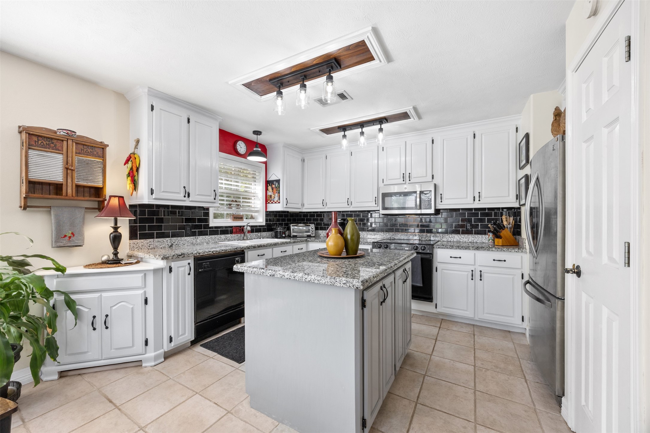 80 Indian Harbor Trinity, TX 75862 - Photo 26 of 47 a kitchen with a sink window and cabinets