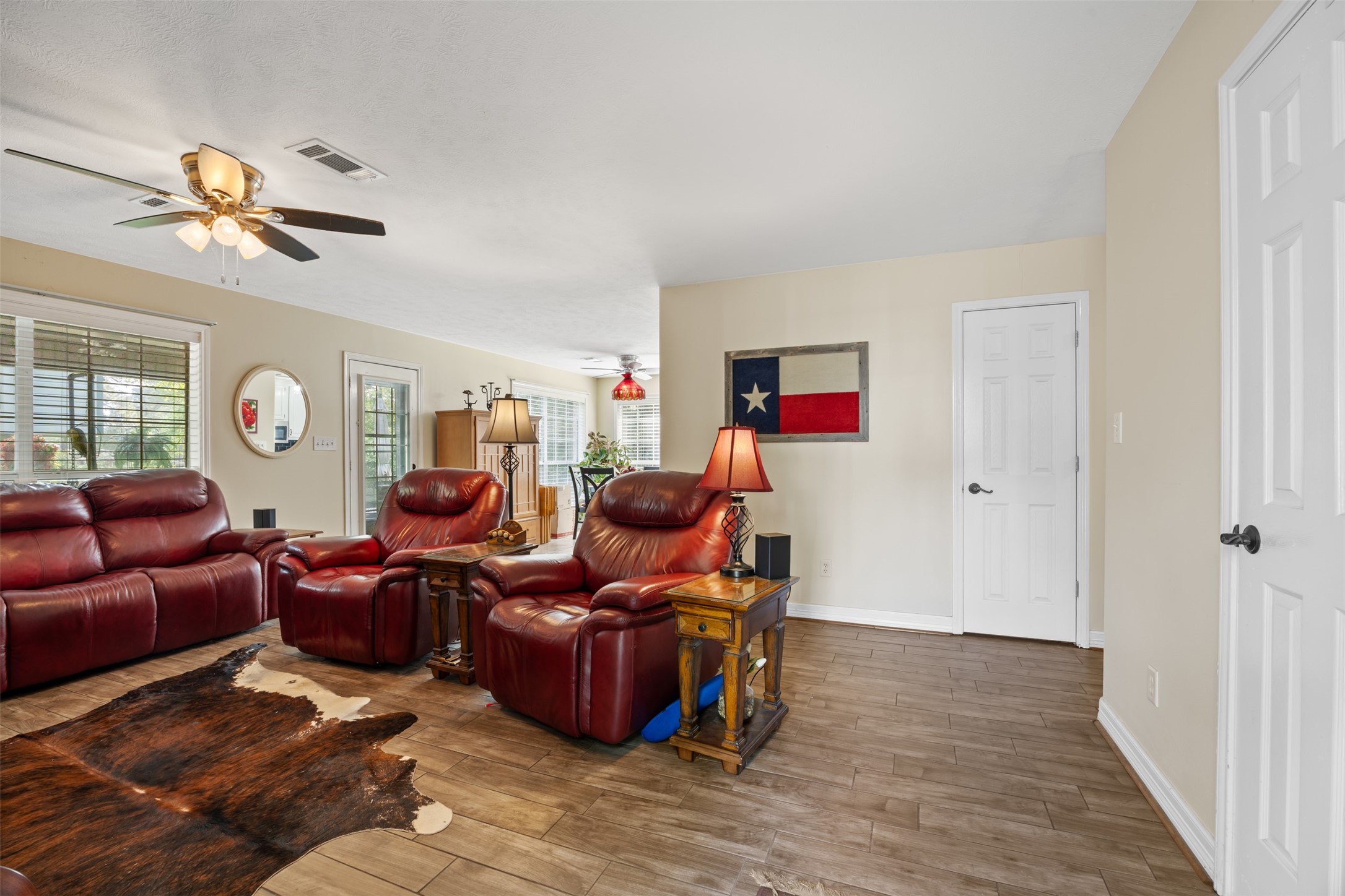 80 Indian Harbor Trinity, TX 75862 - Photo 32 of 47 a living room with furniture a ceiling fan and a window