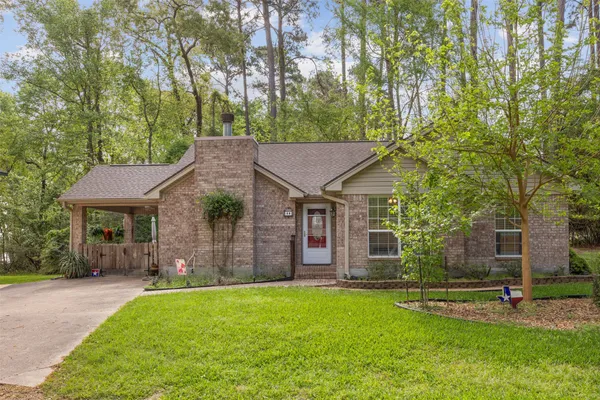 a bed room with furniture and a window