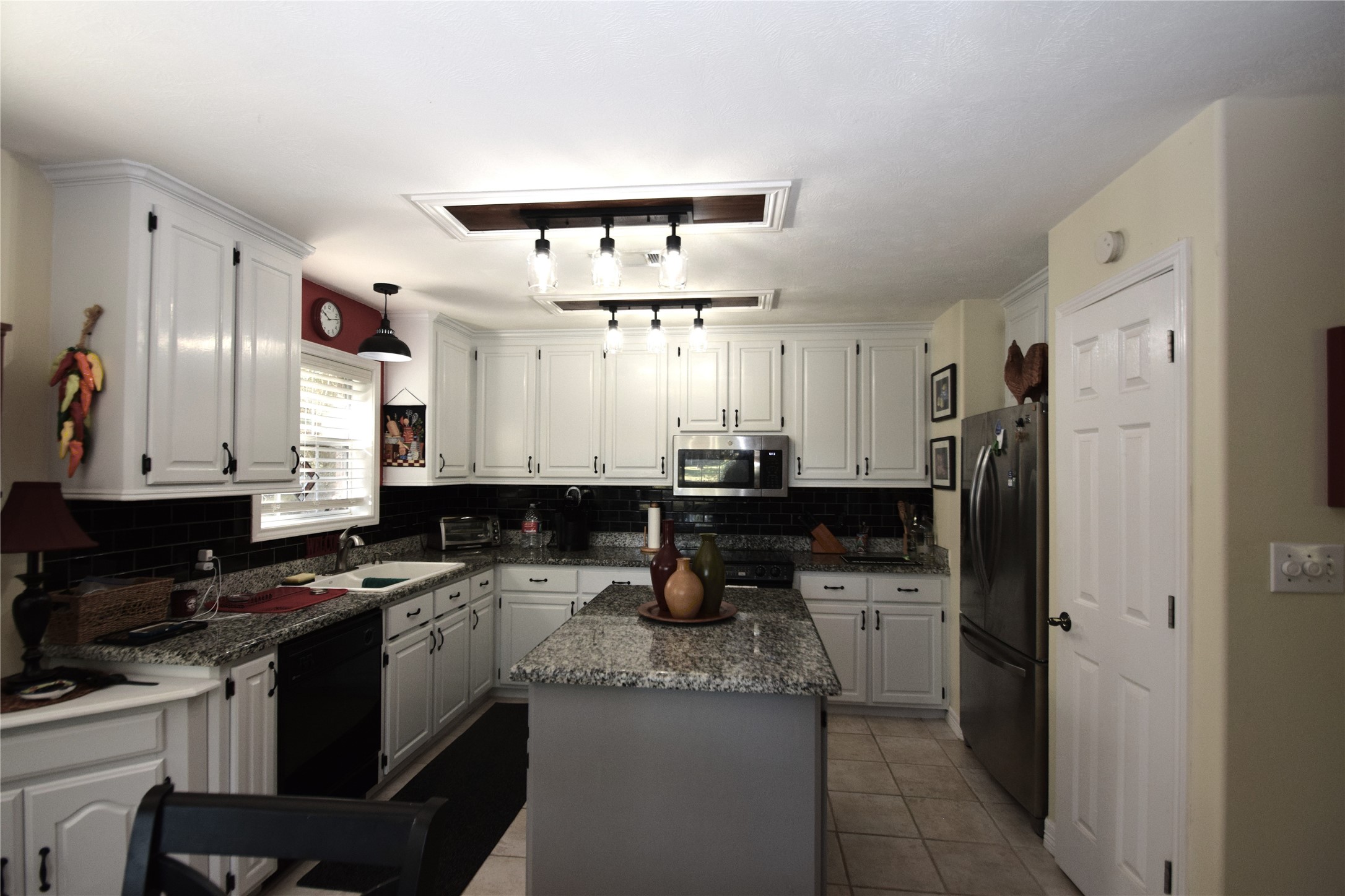 80 Indian Harbor Trinity, TX 75862 - Photo 9 of 15 Open kitchen with new fixtures , lighing and painted cabinets