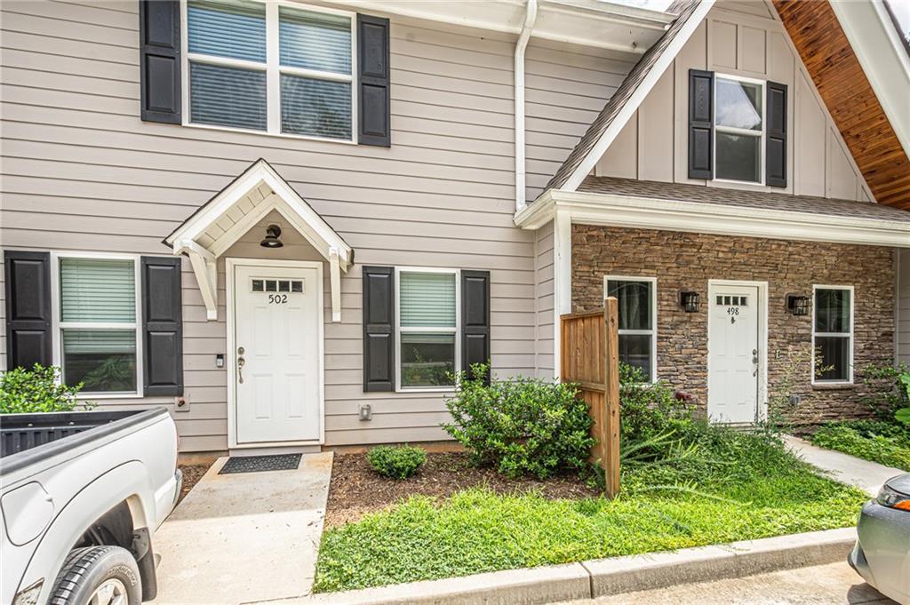 502 Wimpy Mill Road Dahlonega, GA 30533 - Photo 29 of 30 a front view of a house with a garden