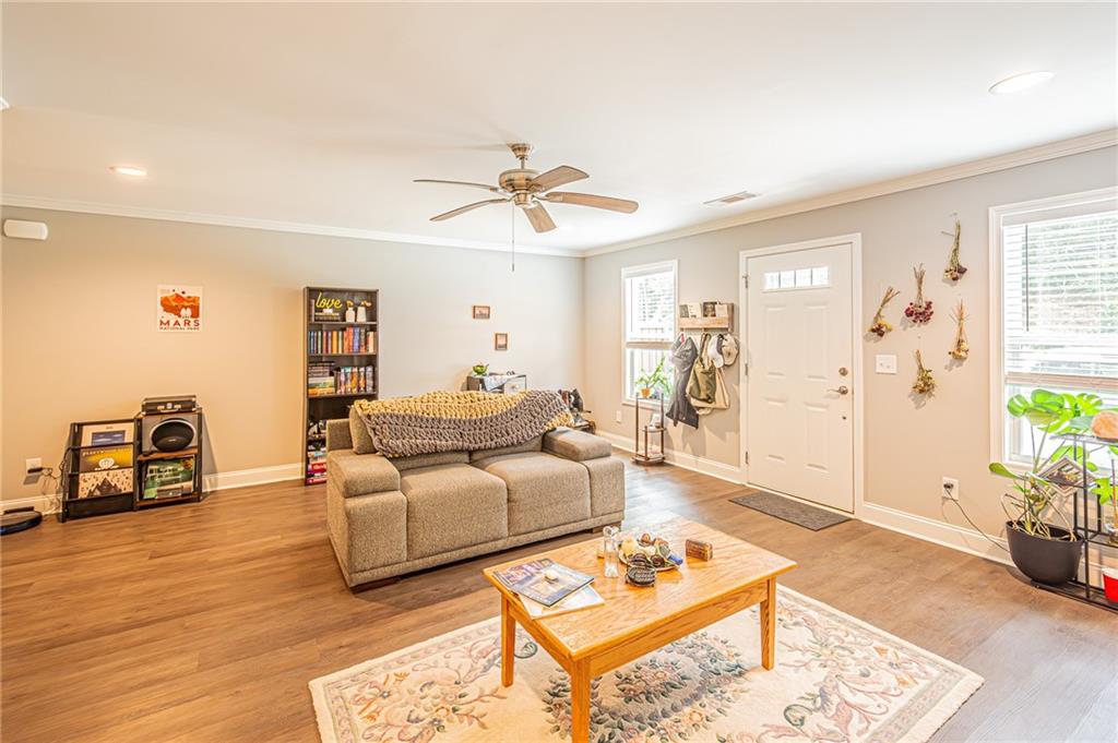 502 Wimpy Mill Road Dahlonega, GA 30533 - Photo 6 of 30 a living room with furniture and wooden floor