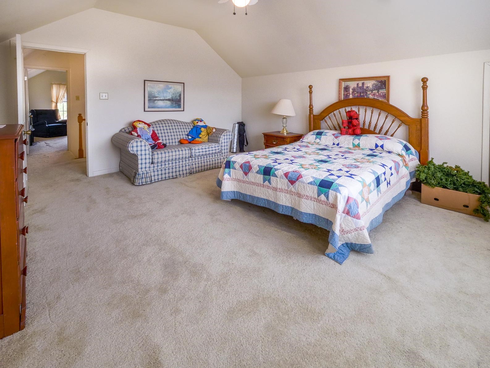 1505 Prairie Valley Road West Point, TX 78963 - Photo 15 of 34 a bedroom with a bed and a chandelier