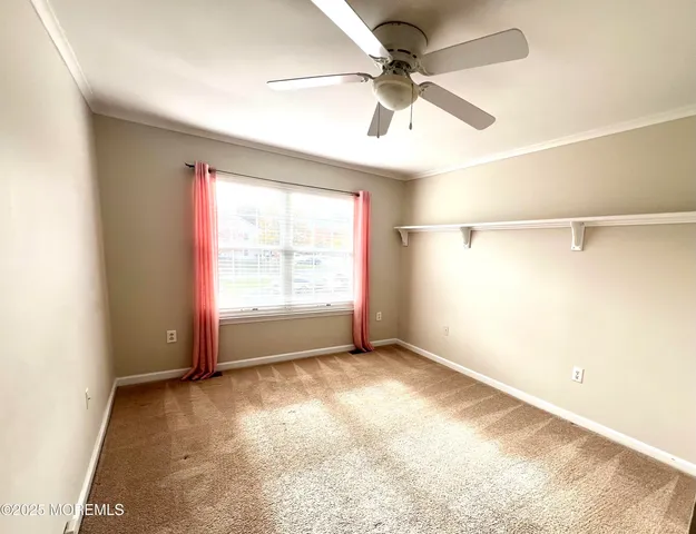 a view of a house with a street