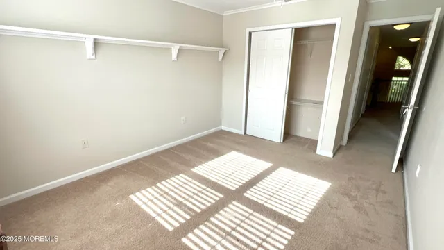 a view of balcony with wooden floor and fence