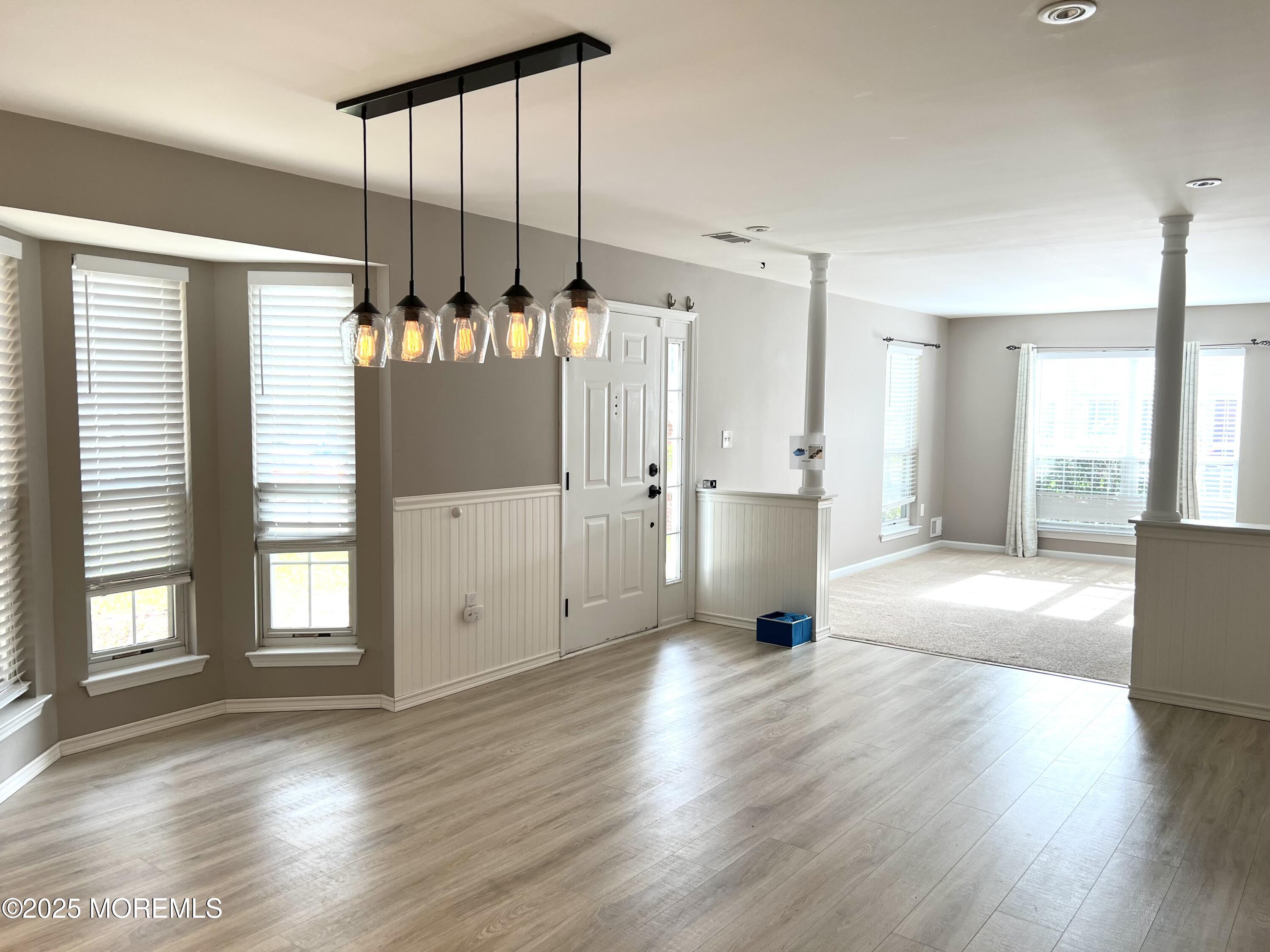 21 Durant Avenue, Unit 145 Holmdel, NJ 07733 - Photo 2 of 25 a view of an empty room with a window
