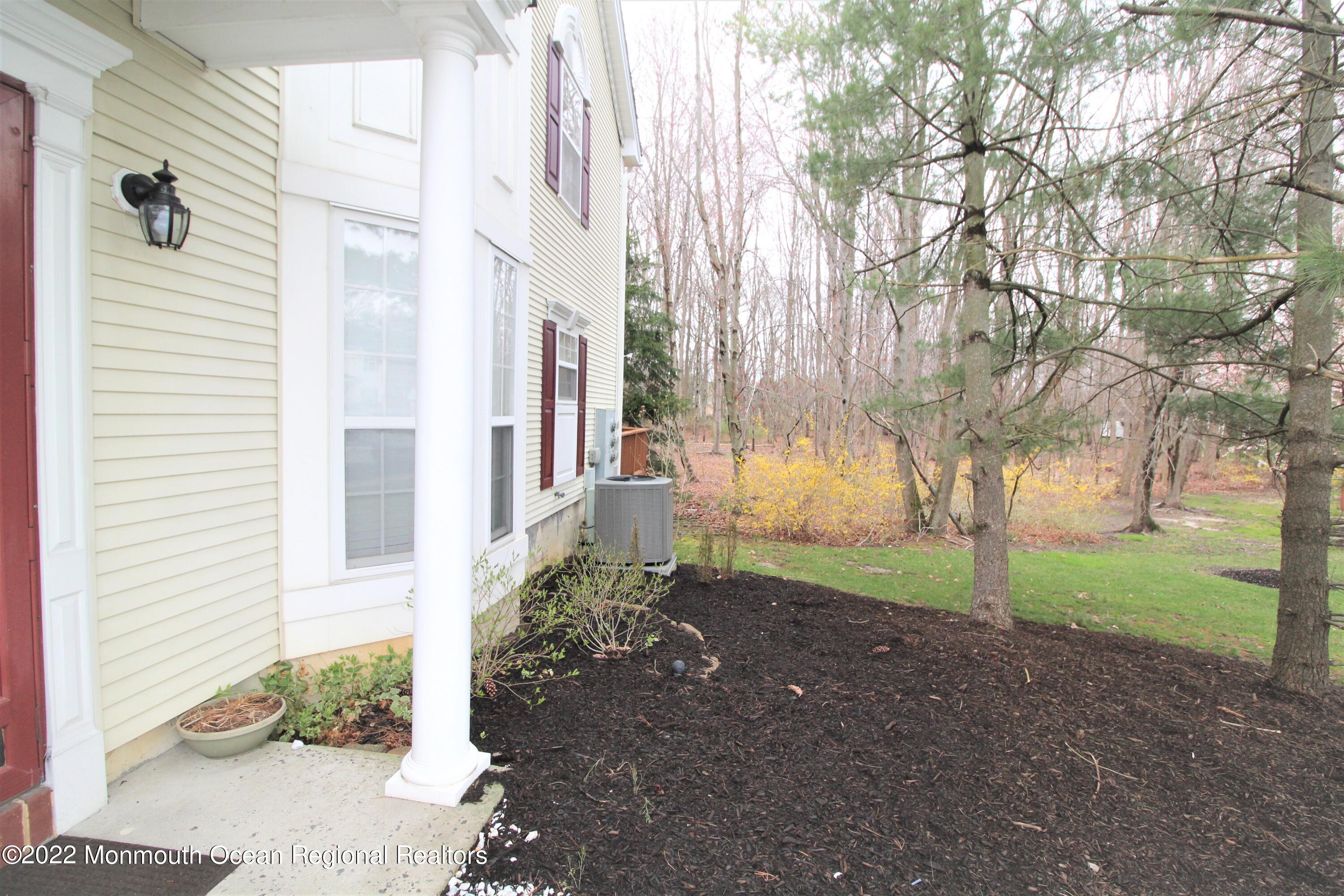 21 Durant Avenue, Unit 145 Holmdel, NJ 07733 - Photo 24 of 25 a view of a house with a street